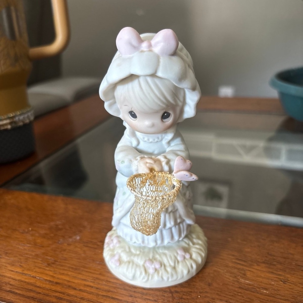 Precious Moments Ceramic Figurine with Pink and Gold Accents